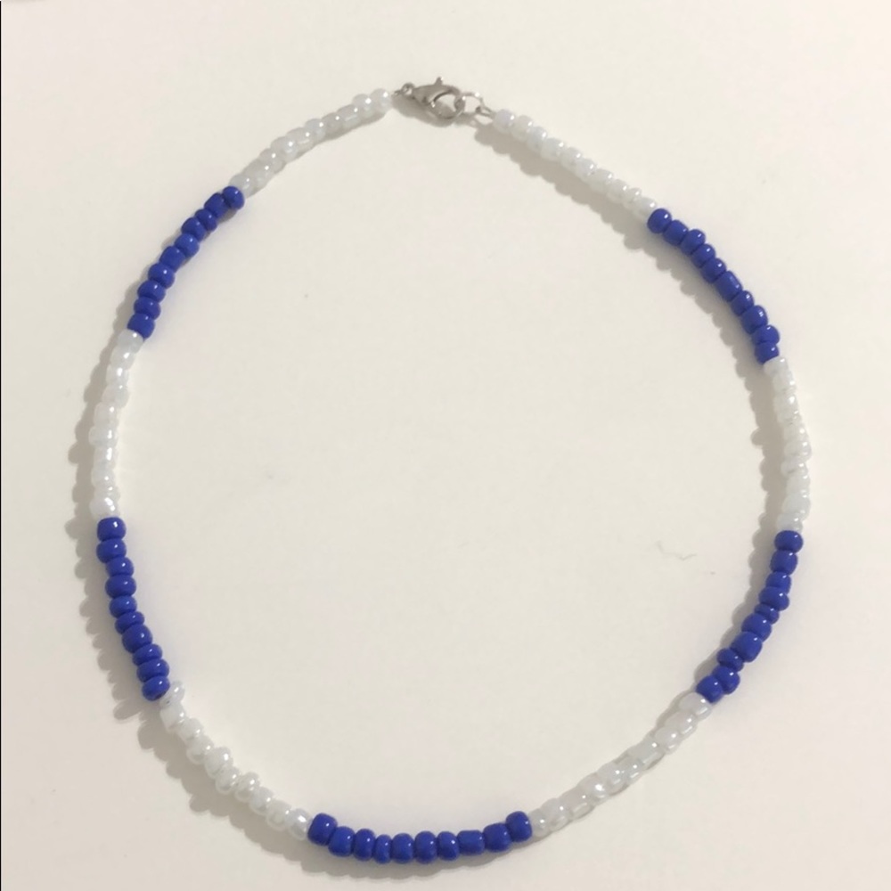 Royal blue and white striped beaded necklace